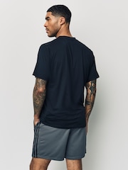رمادي - شورت رياضي بيكيه 3 خطوط Train Essentials من Adidas - صورة 2 من 4