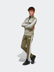 أخضر - adidas Seasonal Essentials Tiberio 3-Stripes Tricot Kids Tracksuit - صورة 1 من 9