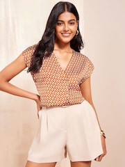 Friends Like These Rust Print Short Sleeve Satin V Neck Blouse - Image 1 of 4
