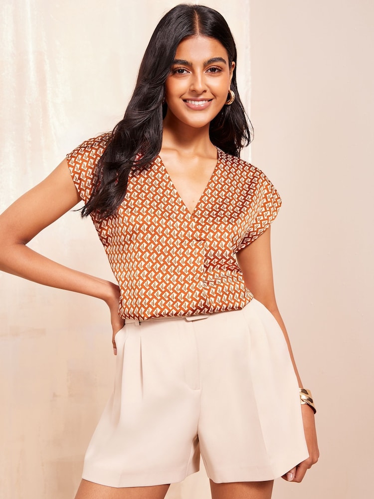Friends Like These Rust Print Short Sleeve Satin V Neck Blouse - Image 1 of 4