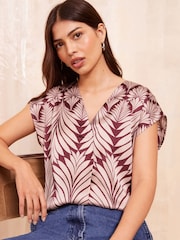 Friends Like These Burgundy Palm Print Petite Short Sleeve Satin V Neck Blouse - Image 1 of 4