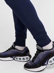 Azul marino medianoche - Pantalones de chándal técnicos con forro polar de Nike - Imagen 8 de 9