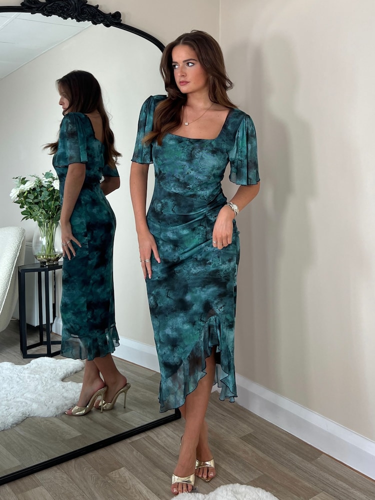 Grün - Girl In Mind Midi-Kleid „Heidi“ mit Rüschen - Bild 1 von 4 Grün - Girl In Mind Midi-Kleid „Heidi“ mit Rüschen - Bild 1 von 4