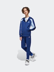 أزرق - بدلة رياضية من قماش فليس بألوان متعارضة من Adidas - صورة 1 من 8