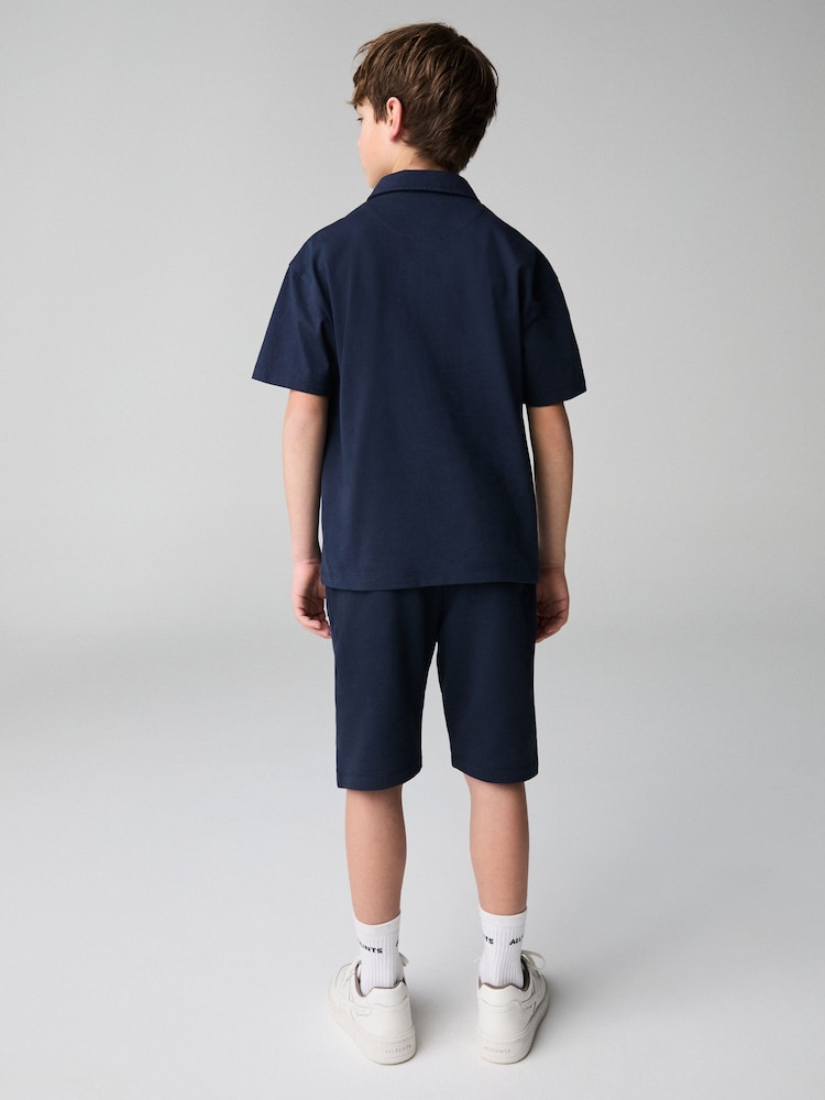 smALLSAINTS Navy Boys Underground 100% Cotton Polo Shirt and Sweat Shorts Set - Image 2 of 6