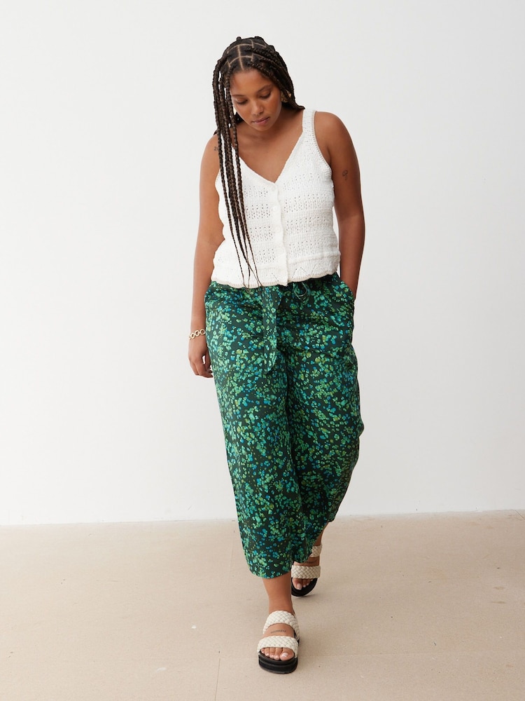 Oliver Bonas Green Chrome Palm Print Culotte Trousers - Image 1 of 9 Oliver Bonas Green Chrome Palm Print Culotte Trousers - Image 1 of 9