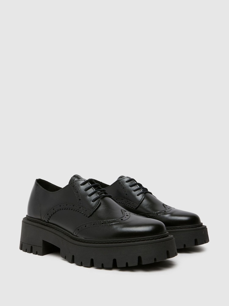 Schuh Liora Chunky Leather črna gležnjar z luknjičastim vzorcem in vezalkami - Slika 2 iz 4