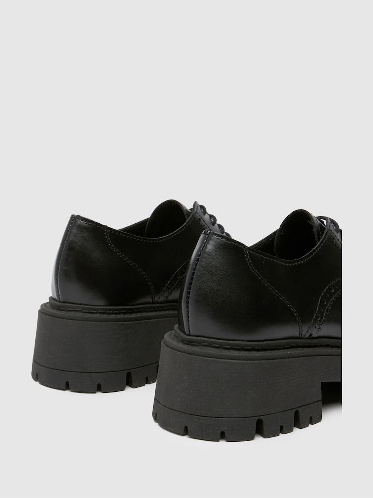 Schuh Liora Chunky Leather črna gležnjar z luknjičastim vzorcem in vezalkami - Slika 4 iz 4