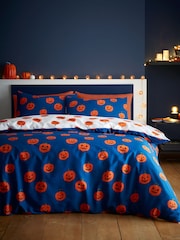 Catherine Lansfield Navy Halloween Pumpkins Reversible Duvet Cover and Pillowcase Set - Image 1 of 5