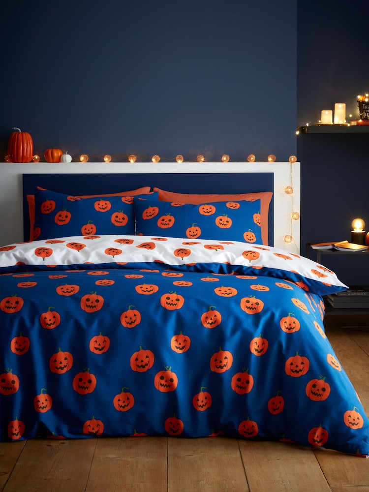 Catherine Lansfield Navy Halloween Pumpkins Reversible Duvet Cover and Pillowcase Set - Image 1 of 5