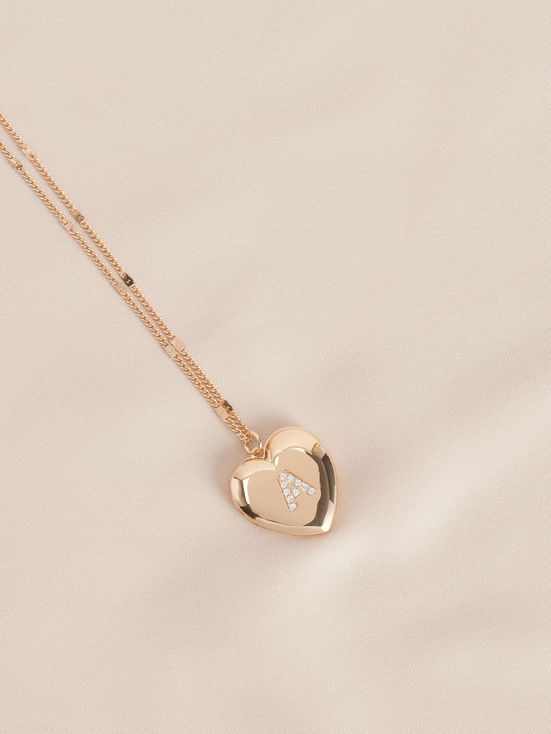 Buy Gold Tone Initial Heart Locket Necklace from Next Netherlands
