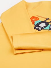 أصفر ـ رداء علوي بخياطة أبليكيه على شكل خفاش هالوين من Frugi - صورة 2 من 5