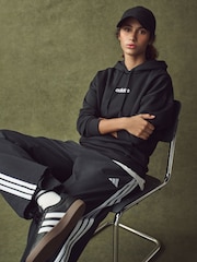 Sudadera de polar con diseño lineal y capucha de adidas - Imagen 4 de 6