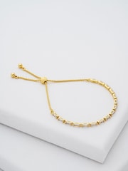 Ted Baker Gold Tone Isela Crystal Baguette Slinky Adjustable Bracelet - Image 1 of 7
