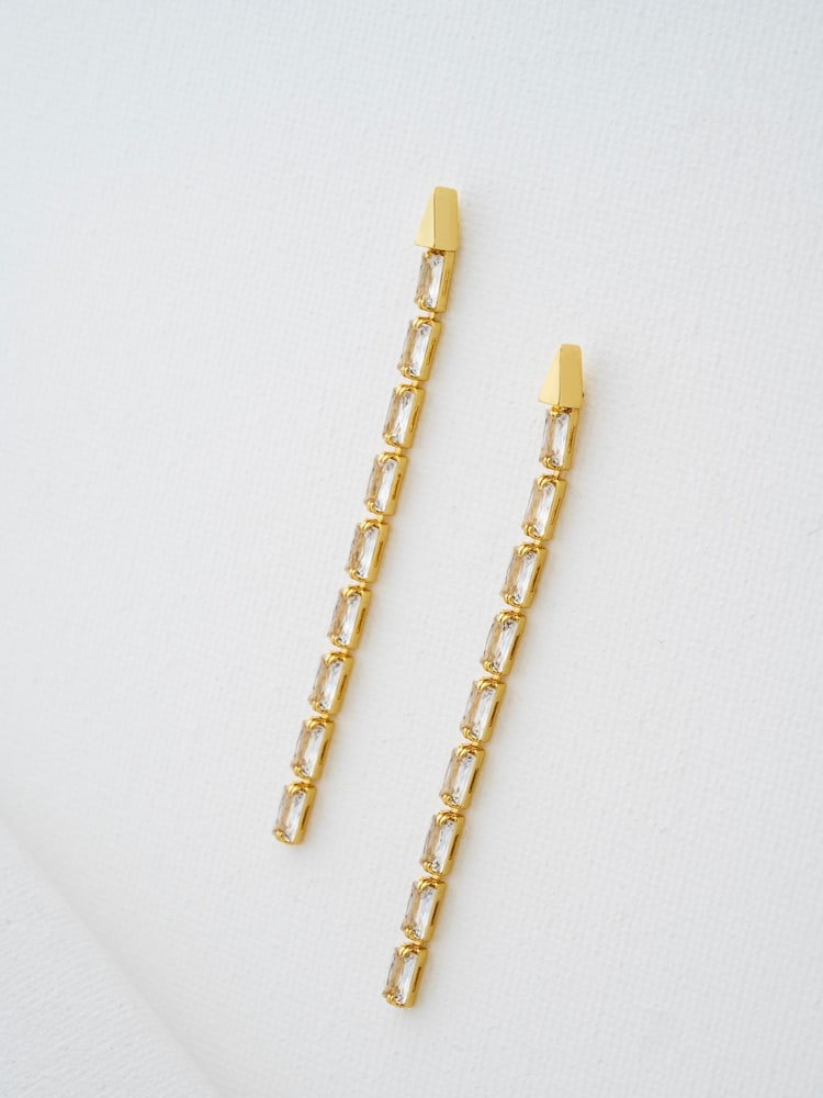 Ted Baker Gold Tone Isalie Crystal Baguette Slinky Drop Earrings - Image 1 of 7