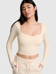 Victoria's Secret PINK White Shell Cropped Fitted Long Sleeve Top - Image 1 of 4