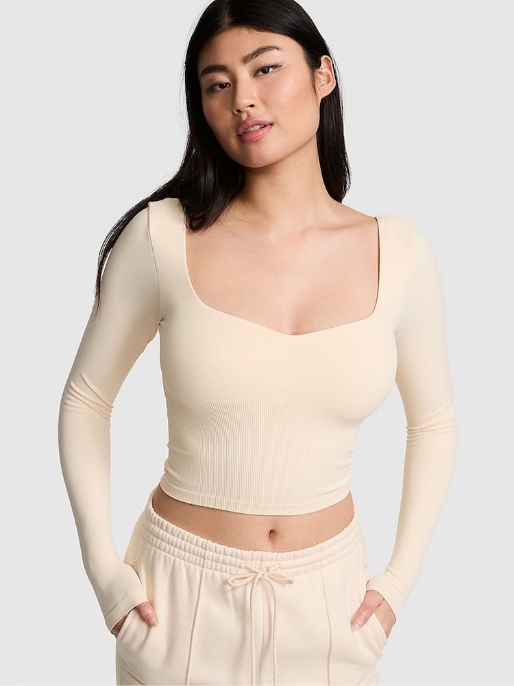 Victoria's Secret PINK White Shell Cropped Fitted Long Sleeve Top - Image 1 of 4