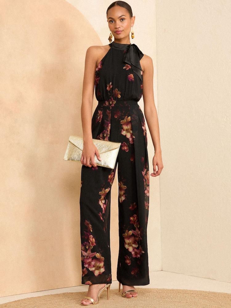 Love & Roses Black Floral Petite Halter Neck Belted Wide Leg Jumpsuit - Image 1 of 4