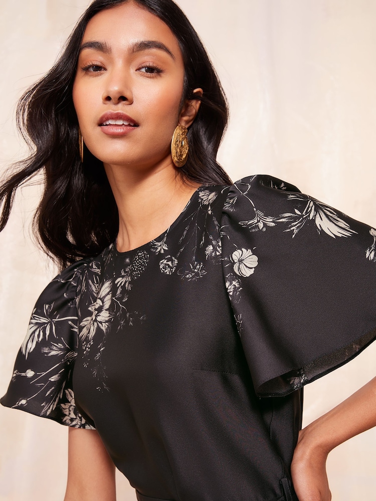 Friends Like These Black/White Flutter Sleeve Printed Satin Midi Dress - Image 2 of 4
