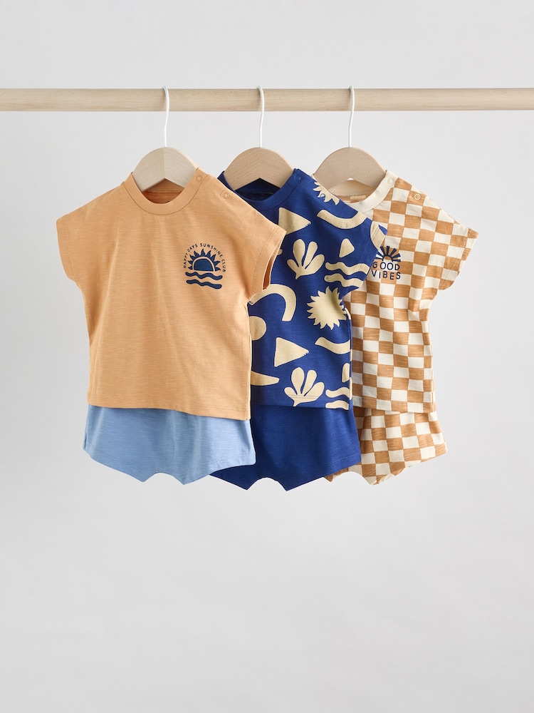 Marineblau/Rostbraun mit Schachbrettmuster - 6-teiliges Baby-Set aus Oberteilen und Shorts - Bild 1 von 14 Marineblau/Rostbraun mit Schachbrettmuster - 6-teiliges Baby-Set aus Oberteilen und Shorts - Bild 1 von 14