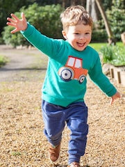 Suéter verde fácil de poner con tractor de Frugi - Imagen 1 de 4