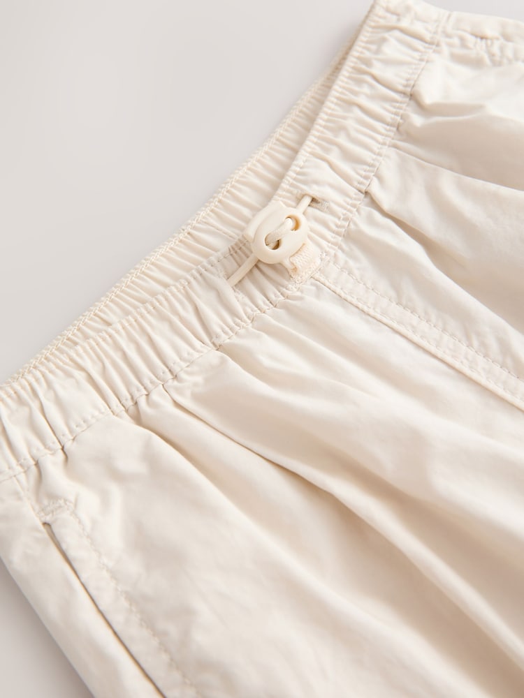 Neutral 100% Cotton Baggy Cargo Trousers with Toggle Waist (3mths-7yrs) - Image 7 of 7 Neutral 100% Cotton Baggy Cargo Trousers with Toggle Waist (3mths-7yrs) - Image 7 of 7