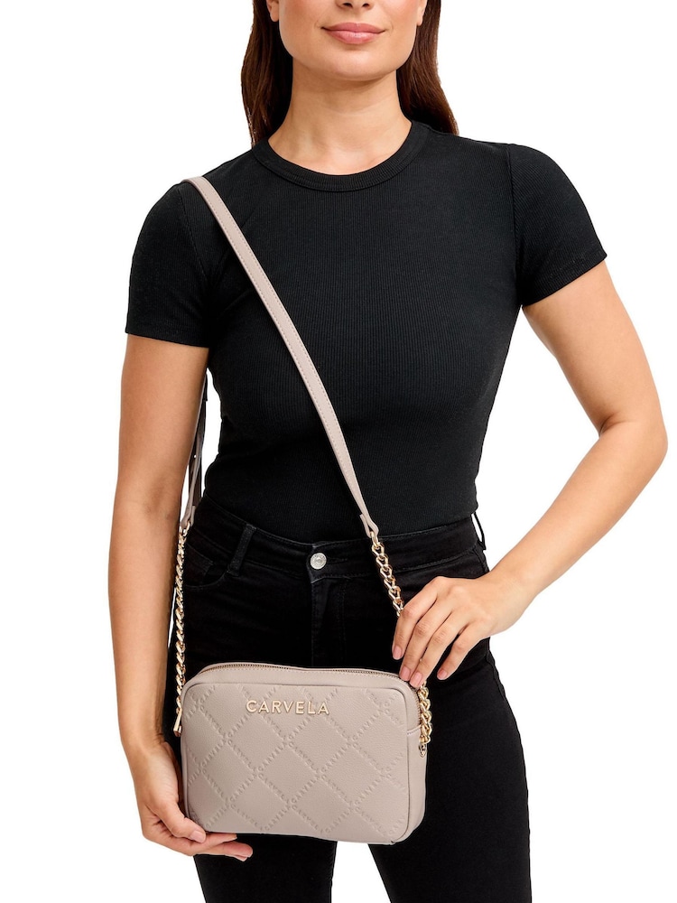 حقيبة تعلق حول الجسم وردية مبطنة من Carvela - صورة 5 من 5