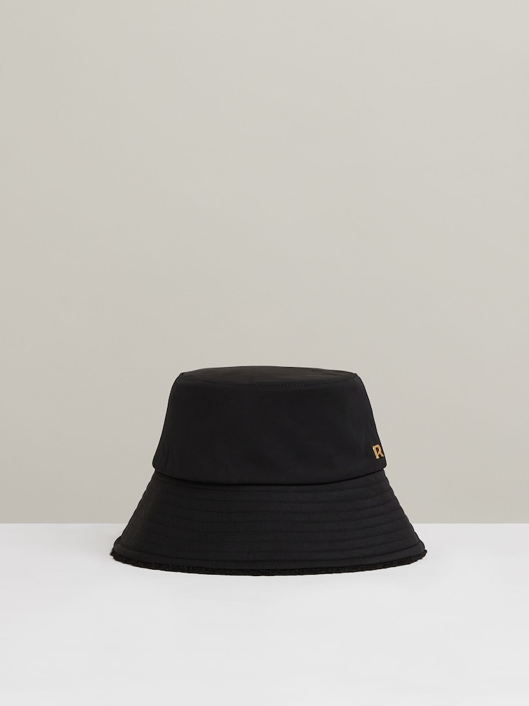 Reiss Black Bella Reversible Fleece and Twill Bucket Hat - Image 1 of 4