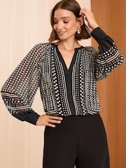 Love & Roses Black/White Polka Dot Pleated V Neck Long Sleeve Blouse - Image 1 of 4