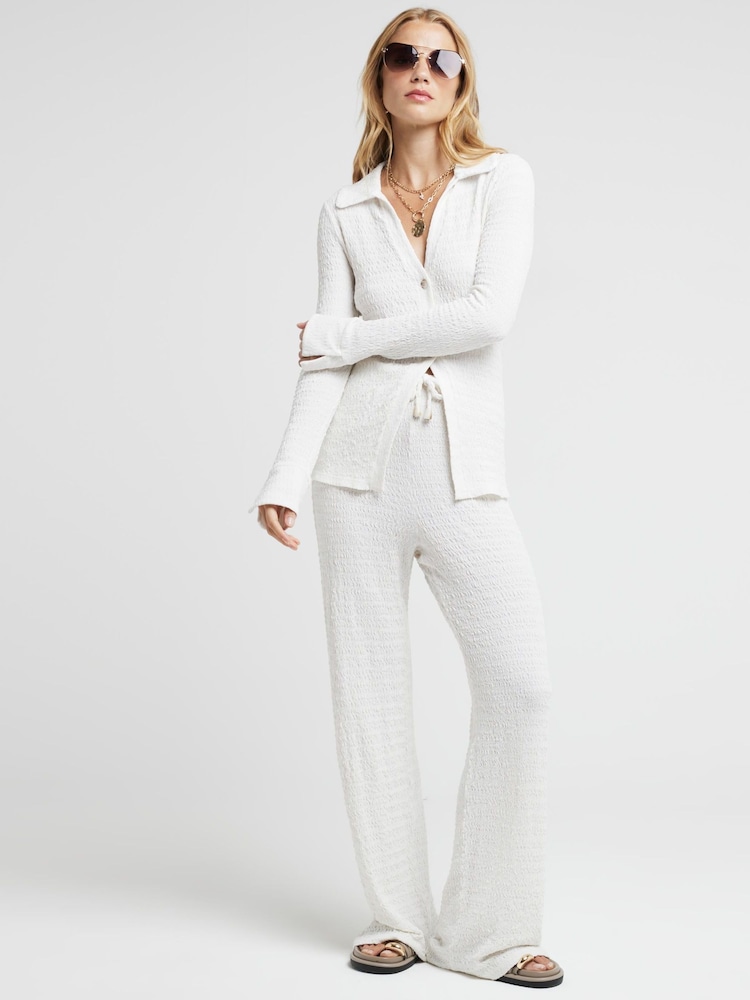 River Island Cream Textured Wide Leg Trousers - Image 1 of 4 River Island Cream Textured Wide Leg Trousers - Image 1 of 4