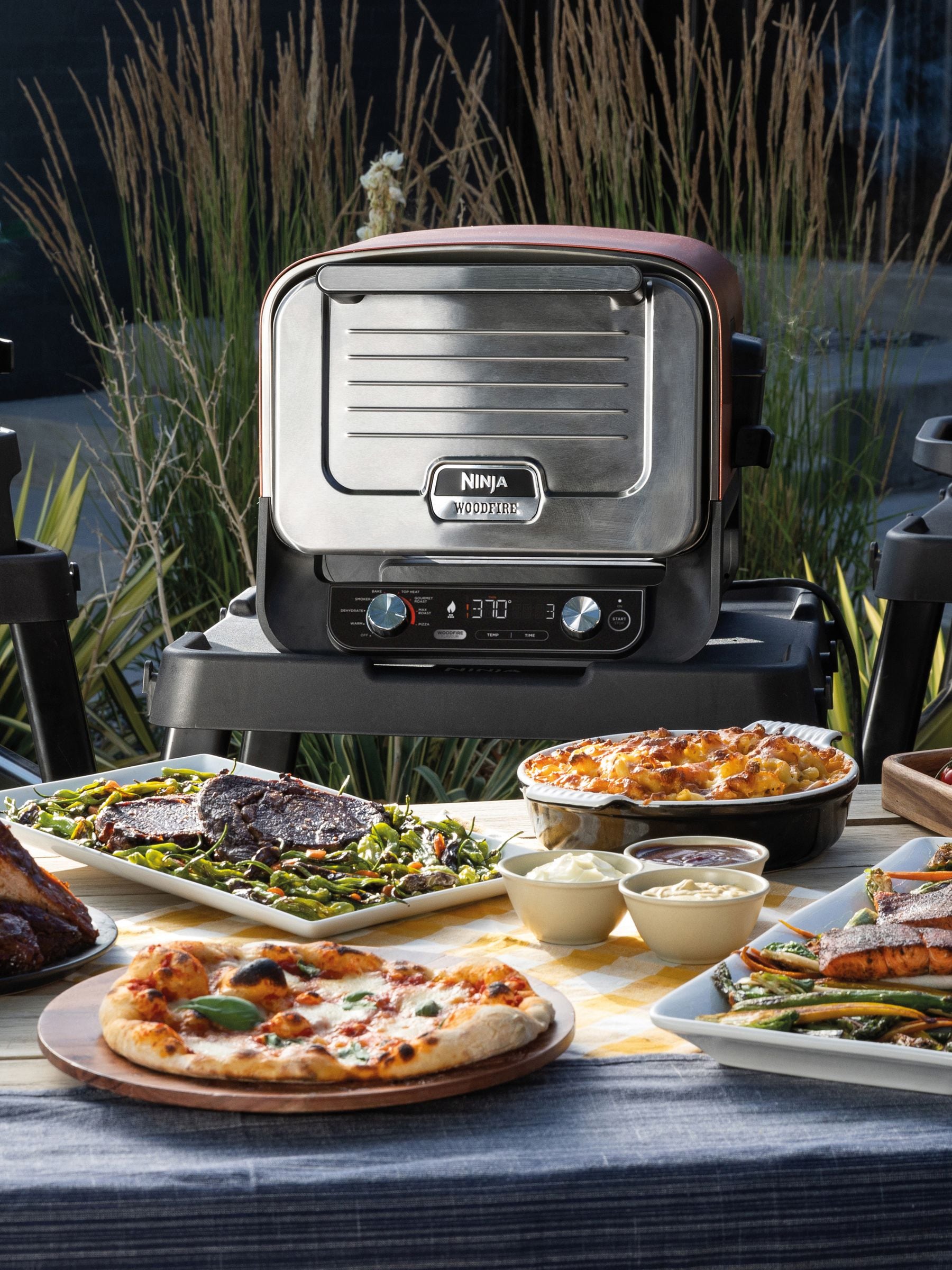 Buy Ninja Woodfire Electric 8-in-1 Outdoor Pizza Oven from the