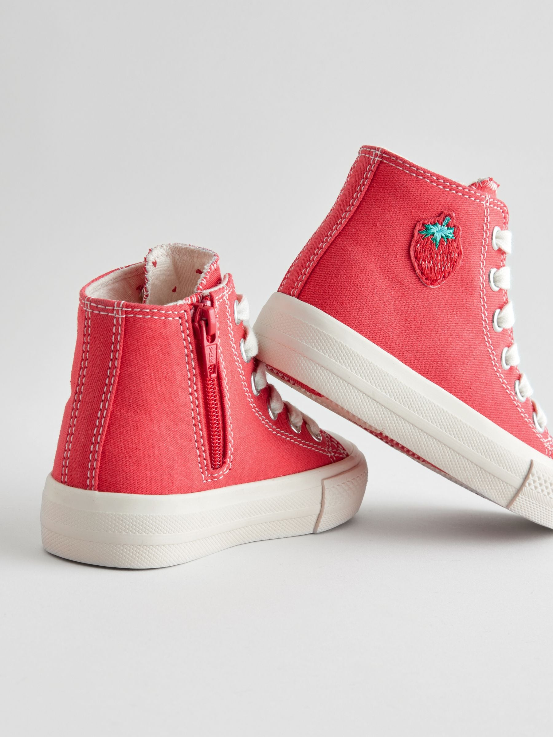 Red high top trainers deals