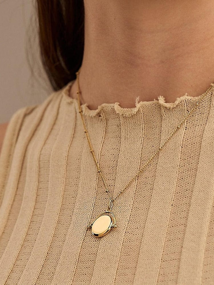 Orelia Luxe Gold Tone Waterproof Luxe Faceted Disc Spinner Necklace - Image 2 of 2