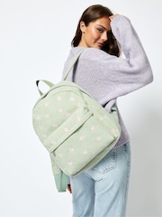 Skinnydip Green Daisy Repeat Backpack - Image 1 of 2