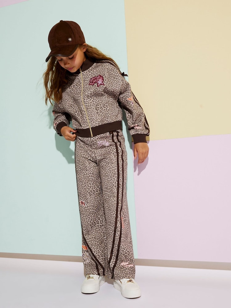 River Island מכנסי טרנינג בגזרה רחבה עם הדפס מנומר - תמונה 1 מתוך 1