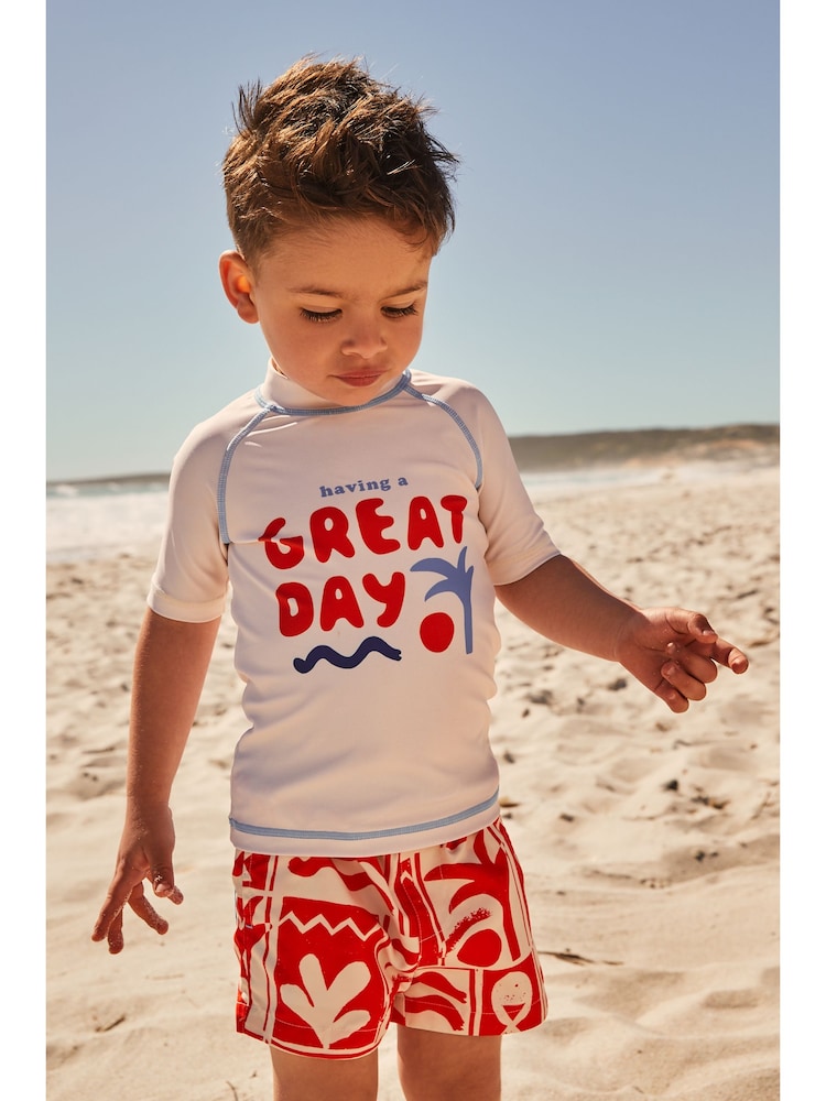Rot / Weiß - Set aus Sonnenschutz-Oberteil und Shorts (3 Monate bis 7 Jahre) - Bild 1 von 4 Rot / Weiß - Set aus Sonnenschutz-Oberteil und Shorts (3 Monate bis 7 Jahre) - Bild 1 von 4
