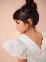 فستان أورجانزا بحواف مُزيّنة بطبعة زهور مستوحاة من حديقة ورد من Laura Ashley - صورة 15 من 19