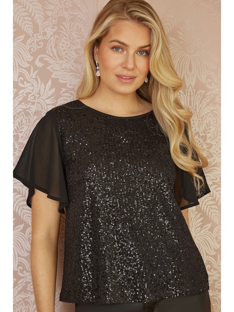 Yumi Black Sequin Top With Sheer Sleeves And Cut Out Back - Image 1 of 5 Yumi Black Sequin Top With Sheer Sleeves And Cut Out Back - Image 1 of 5