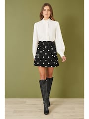 Yumi Black Mini Corduroy Embroidered Daisy Skirt - Image 1 of 4