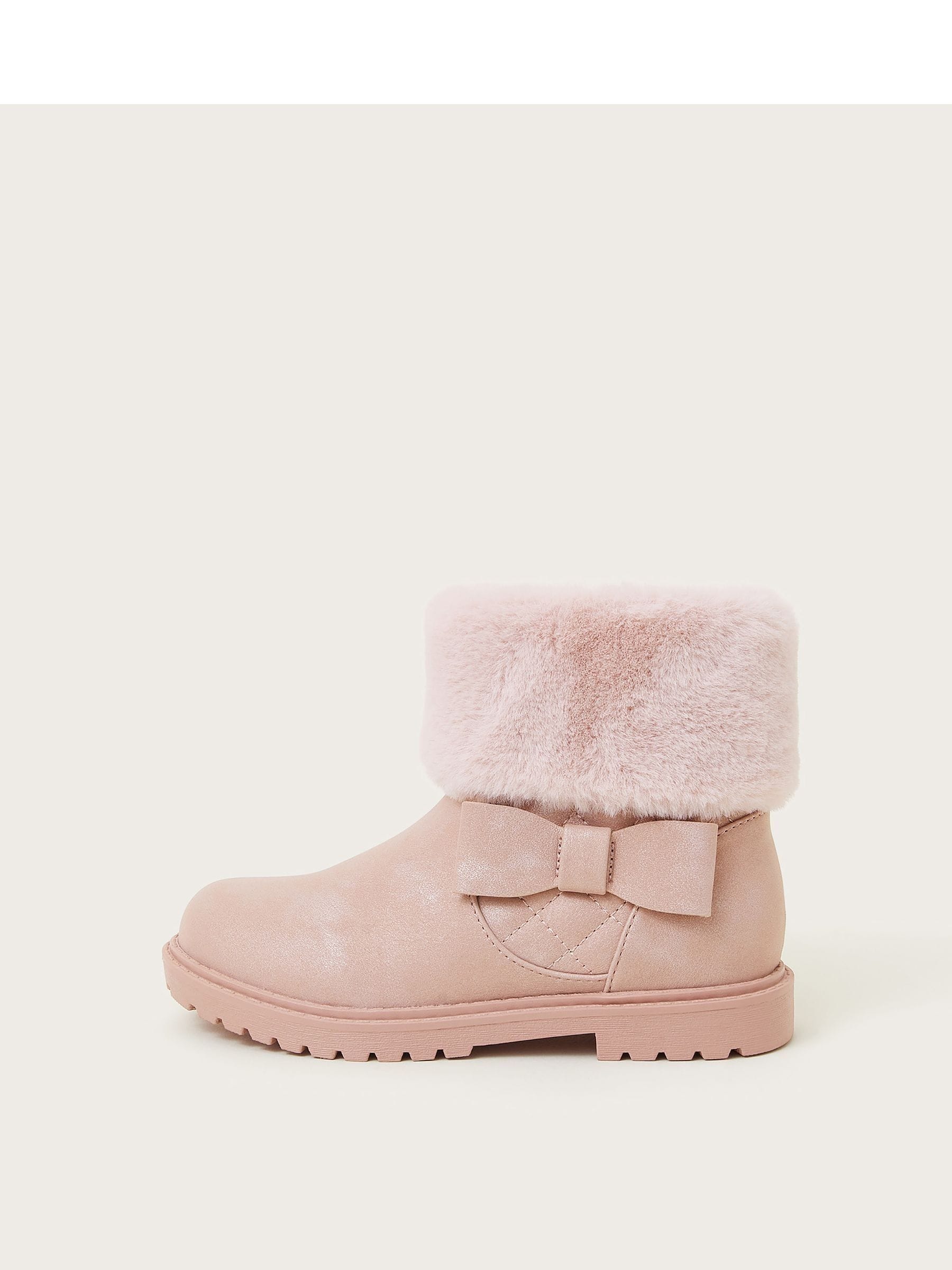 Pink furry boots hotsell