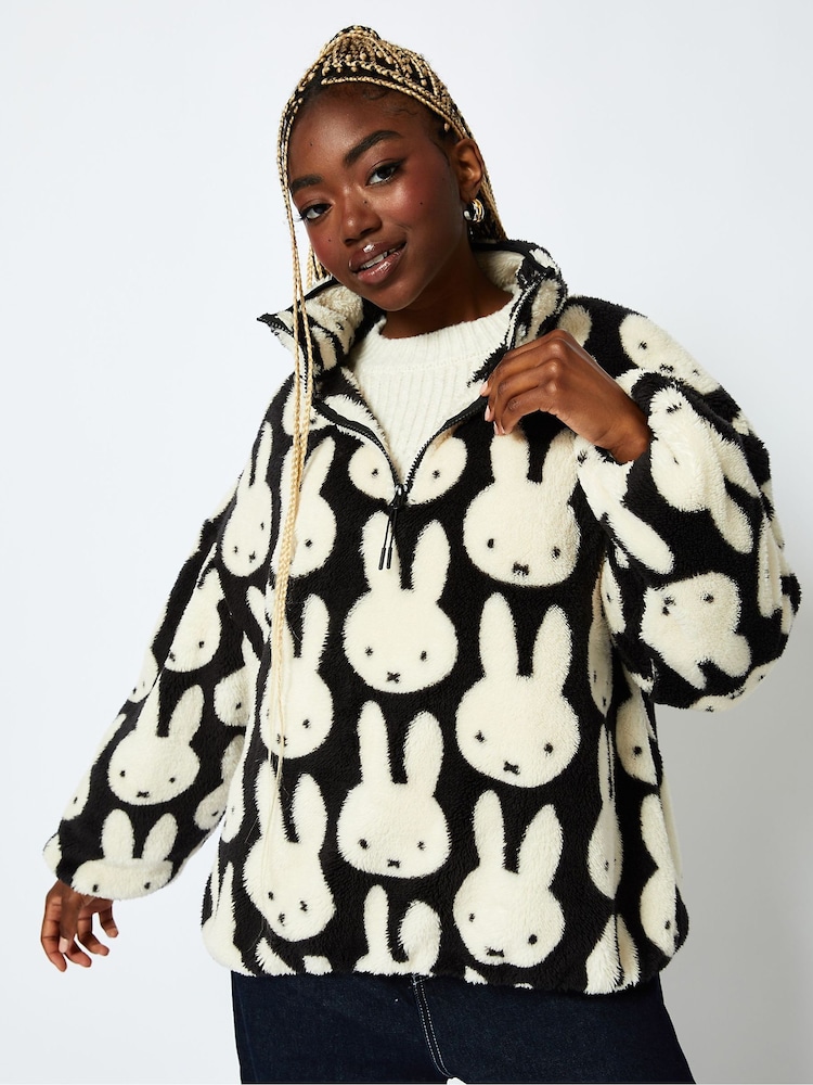 Miffy x Skinnydip Repeat Print Longline Fleece in Black and White - Image 1 of 6 Miffy x Skinnydip Repeat Print Longline Fleece in Black and White - Image 1 of 6