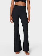 Sweaty Betty Black Glow Flex Rib Flare Trousers - Image 1 of 7