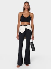 Sweaty Betty Black Glow Flex Rib Flare Trousers - Image 3 of 7
