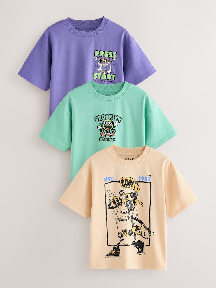 Green/Blue Cartoon Relaxed Fit Graphic Print Short Sleeve T-Shirts 3 Pack (3-16yrs) - Image 1 of 1 Green/Blue Cartoon Relaxed Fit Graphic Print Short Sleeve T-Shirts 3 Pack (3-16yrs) - Image 1 of 1