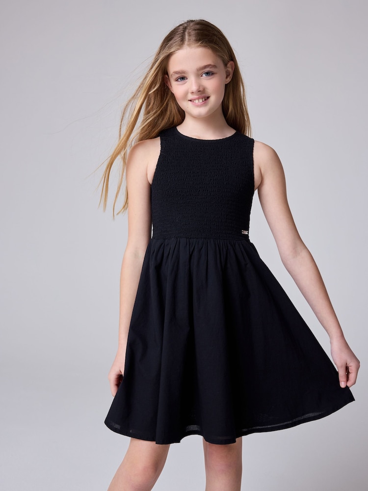 smALLSAINTS Black Ode Smocked Sleeveless 100% Cotton Dress - Image 1 of 11