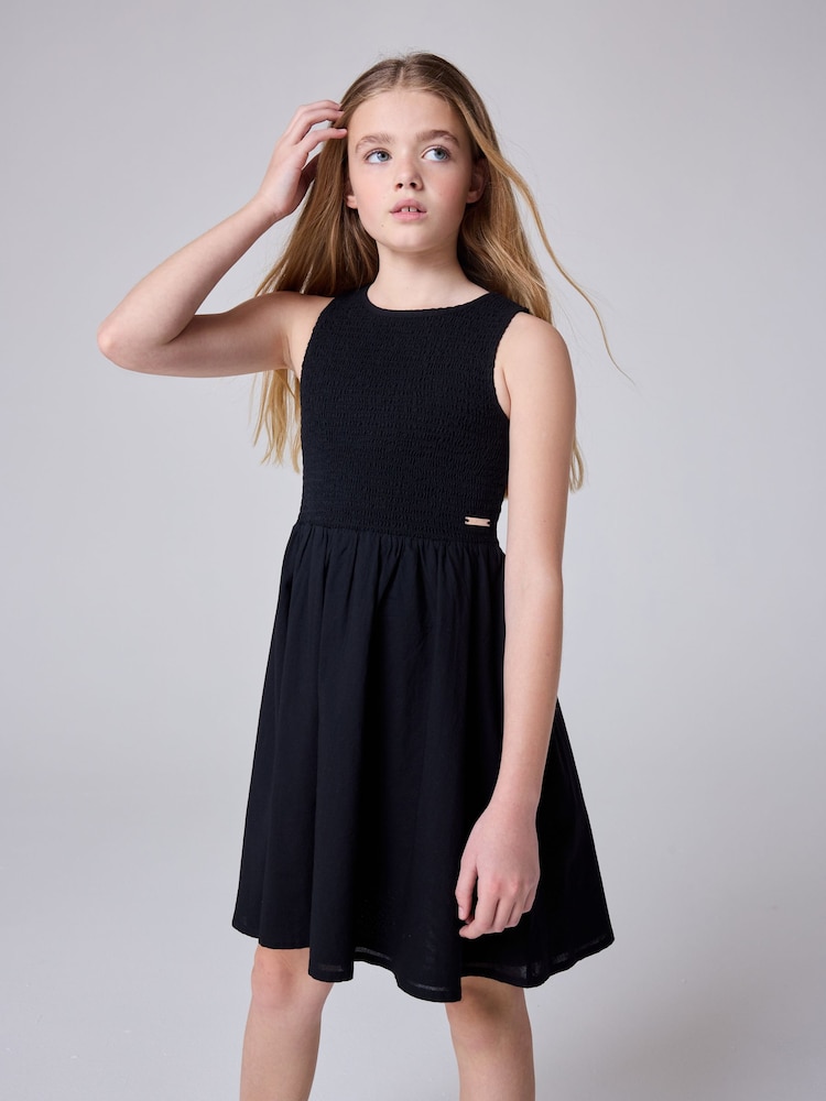smALLSAINTS Black Ode Smocked Sleeveless 100% Cotton Dress - Image 2 of 11