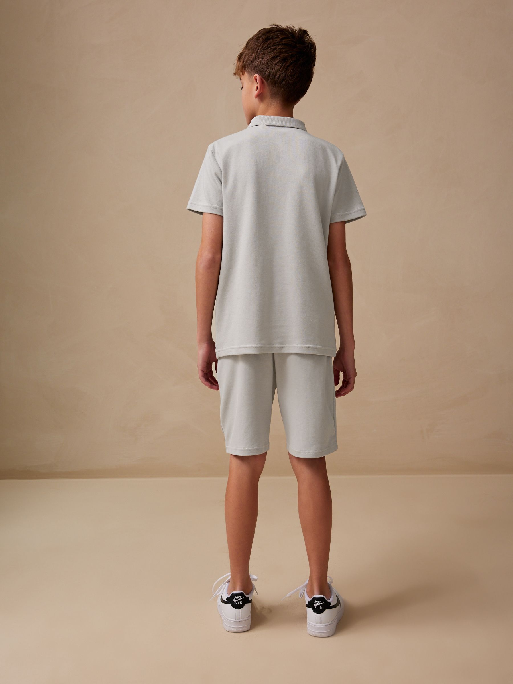 Buy Grey/White Zip Neck Stripe Polo Shirt and Shorts Set (3-16yrs
