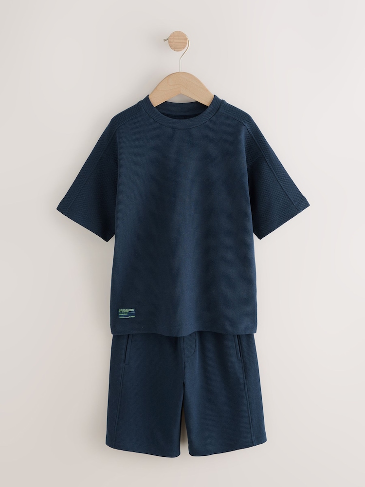 Azul marino - Conjunto de pantalón corto y camiseta de manga corta con diseño texturizado (3-16 años) - Imagen 1 de 7 Azul marino - Conjunto de pantalón corto y camiseta de manga corta con diseño texturizado (3-16 años) - Imagen 1 de 7