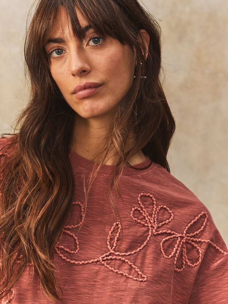 Rust Red 100% Cotton Tonal Corded Detail Short Sleeve Crew Neck T-Shirt - Image 1 of 8 Rust Red 100% Cotton Tonal Corded Detail Short Sleeve Crew Neck T-Shirt - Image 1 of 8