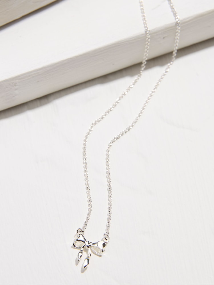 FatFace Silver Tone Bow Necklace - Image 2 of 2